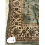 @21st cent Rugs: Keshan rug, green ground. 1.90 x 1.40.