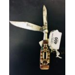 Corkscrews/Wine Collectables: Champagne bottle shaped steel knife, 2 blades, treen handle inlaid