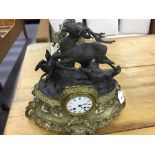 Clocks: Table clock in gilt metal and spelter, mounted with a stag hunt scene. the movement, Japy
