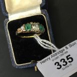 Diamond & Emerald Jewellery: Boat shaped ring, centre stone ·75 plus two others ·10, emeralds cut