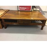 20th cent. Indonesian hardwood coffee table. All sides have black metal grilles and each side a