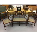 Edwardian mahogany harlequin salon suite with upholstered seating. Inlaid banding.