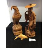 Treen Figurines: 19th cent. Treen figurines, depicting a Japanese Fisherman 8ins. tall, an Eagle