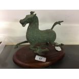 20th cent. Chinese metal horse figure in the style of 17th/18th cent. Tourist ware, the whole on a