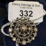 Diamond Jewellery: 19th cent. Circular brooch set with old cut stones in white & yellow metal, outer