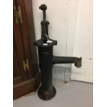 19th/ 20th cent. Cast iron hand water pump and spout 26½ins. x 13ins.