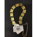 Yellow Metal Jewellery: "Zodiac" bracelet - signs, tests 14k, 24gms, safety chain test 9ct. 2 gms.