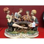 Ceramic Figure: Large Capodimonte figures "The card cheats sat at a table with wine bottle",