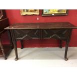 Early 18th cent. Oak side table in an Elizabethan style, rising off 4 pad feet.