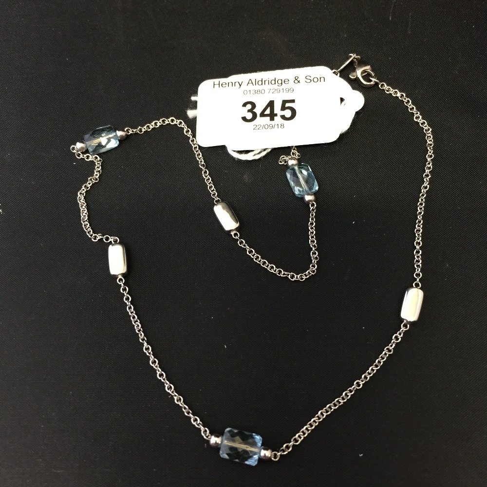 Hallmarked white gold 750 necklace Aqua marine stones 3. Interlaced with white gold ingots.