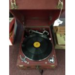 Gramophones: 20th cent. Columbia wind up gramophone with red leatherette case, tin of HMV needles,