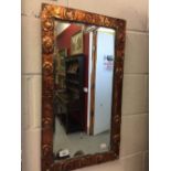 19th cent. Arts & Crafts: Copper framed wall mirror. 15ins. x 27ins.