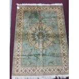 @21st cent Rugs: Keshan rug, green ground. 1.90 x 1.40.