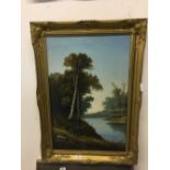 Early 20th cent. British School: Oil on canvas, 'River winding through a wood', ornate gilt frame.