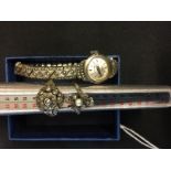 Marcasite Jewellery: Excalibur wristwatch and two rings. (3)