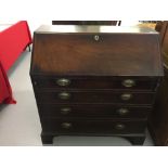 Georgian mahogany bureau, drop down flap with fully fitted interior. Graduated four drawers with