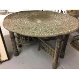 19th cent. Islamic brass folding table with large brass top.