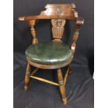 OCEAN LINER: Early 20th century Anchor Line oak open arm dining chair. House flag on top rail,