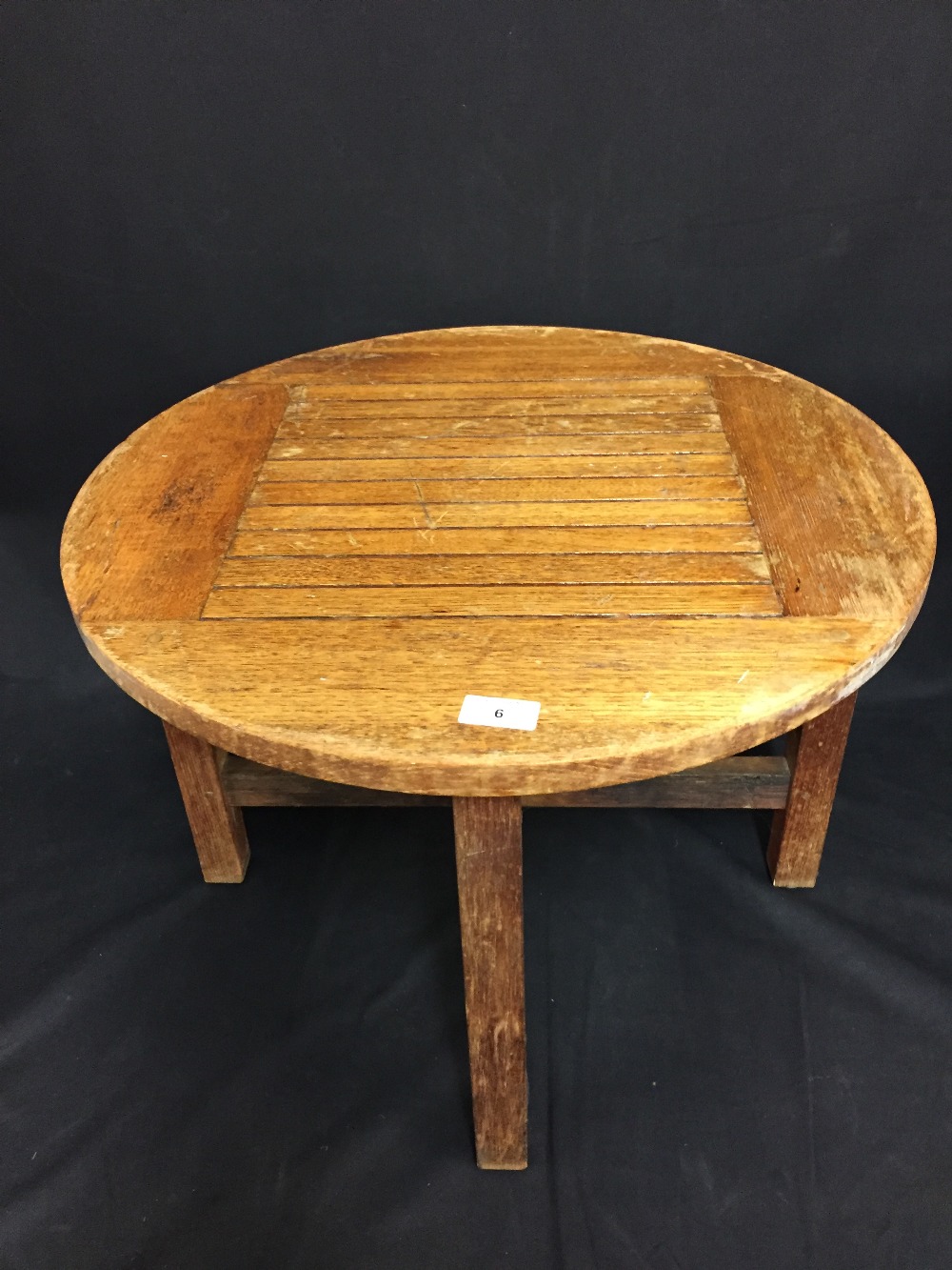 CUNARD: 20th Century teak circular coffee table with small plaque "Made by the Hughes Bolckow