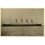 R.M.S. TITANIC: Rare Rapp of Southampton real photo postcard of Titanic at Sea.