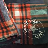 WHITE STAR LINE: First Class tartan deck blanket with woven "White Star Line" to one corner. Some