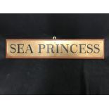 OCEAN LINER: P&O brass name plaque for the Sea Princess on an oak backing board. 34ins. x 6ins.