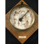 OCEAN LINER/CUNARD: Circular brass pressure gauge on a contemporary oak backing with plaque