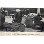 R.M.S. TITANIC: Underwood and Underwood real photo postcard "Group of Titanic's rescued passengers