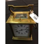 19th cent. French brass repeating carriage clock, white enamel dial.