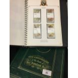 Stamps: 1979 - two x commemorative Stanley Gibbons albums containing stamps from around the world