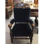 Early 20th cent. Oak Carolean style hall chair. Blue velvet/draylon upholstered back, seat and arm