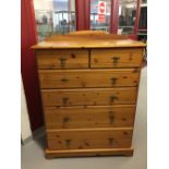 20th cent. Pine 2/4 chest of drawers, on a plinth.