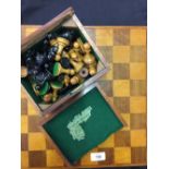 Games and Pastimes: An ebony and walnut Jaques chess set , with treen board.