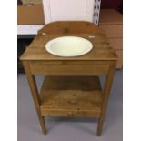 20th cent. Pine two tier, washstand with drawer beneath. Ceramic bowl, restored. 31½ins. x 21½ins. x