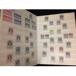 Stamps: 1953 Commonwealth stock book containing unused and used examples of the stamps issued to