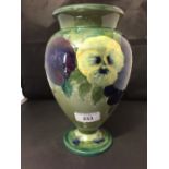 Moorcroft - The Newman Collection: c1914 Pale green ground baluster shaped vase in the pansy