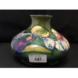 Moorcroft - The Newman Collection: c1946 Squat baluster vase, Orchid pattern on green ground, with