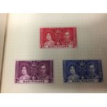 Stamps: Coronation 'Stamps of the Empire.' An album containing the Coronation Issues (crown