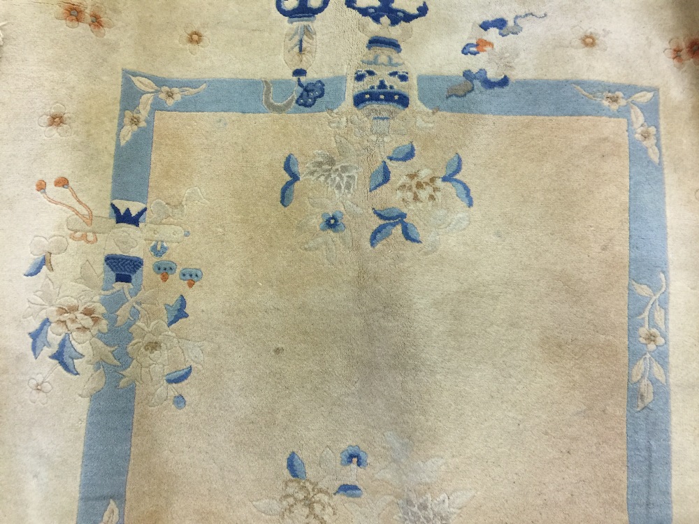 Carpets & Rugs: 20th cent. Washed Chinese, cream ground with blue border & brown oriental designs.