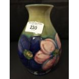 Moorcroft - The Newman Collection: c1952 Baluster vase, Anemone pattern on green ground, 6½ins.