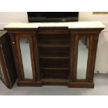 Late 19th cent. Rosewood breakfront cabinet with 2 mirrored doors opening to reveal shelves,