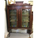 20th cent. Mahogany lead two door glazed bookcase with stained glass flowers, painted decoration