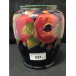 Moorcroft - The Newman Collection: c1916 Baluster vase, pomegranate pattern on dark blue ground,