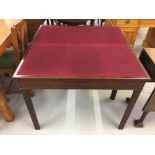 19th cent. Mahogany fold over games table on square supports. 35½ins. x 28½ins. x 17½ins.