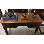 19th cent. Mahogany ladies desk, four drawers on turned and gadrooned supports, ceramic castors.