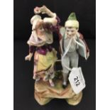 19th cent. Vienna figure of a male holding grapes, with a female holding a flower. No. 1368. 5½ins.