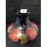 Moorcroft - The Newman Collection: c1920 Large squat vase, pomegranate pattern on dark blue