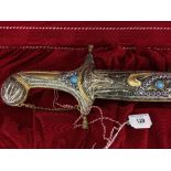 Edged Weapons: A Qatar presentation sword, the hilt and scabbard bedecked in jewels and inscribed
