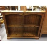 20th cent. Pine Ducal two section, six shelf bookcase with reeded supports. 57½ins. x 47½ins. x 12¼