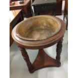 19th cent. Mahogany gentleman's washstand with copper bowl insert. on three turned supports.